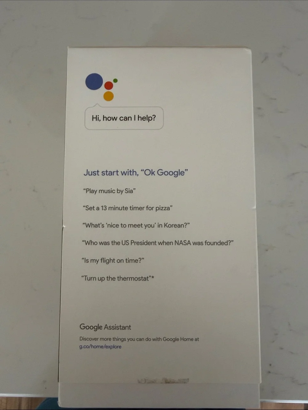 google Home Smart Speaker in White and Gray